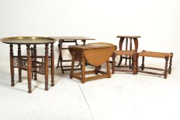 A collection of furniture to include rattan weave stools, a yellow velour upholstered oak