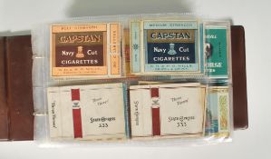 A full album of vintage cigarette packets dating from the 1920's to include Capstan, Pathfinder,