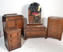 An early 20th Century Art Deco matching oak bedroom suite consisting of dressing table and