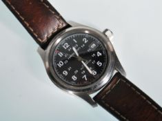 A gentleman's Hamilton Khaki automatic military style wrist watch having a round black face having