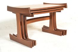 A 1970 retro vintage Gplan ' Katrina ' teak wood nest of tables having graduating sizes. The legs