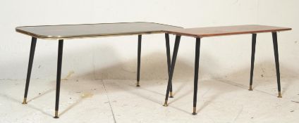 A retro mid 20th Century lacquered coffee table having a geometric gold and red diamond design on