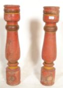 A pair of very large vintage 20th Century Indian  hardwood painted floor standing candlestick