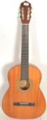 A vintage 20th Century six string acoustic six str