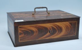 A 19th Century painted scrumble finish metal strong box, the hinged lid with carry handle above over