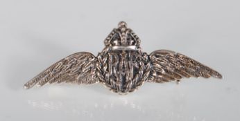 A sterling silver RAF sweetheart winged brooch. Stamped sterling. Weighs 3.5g. Measures 4cm wide.