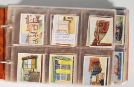 A Collection of 20th Century vintage Churchmans cigarette trade cards in full sets stored within