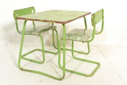 A retro 20th Century child's picnic table and chai
