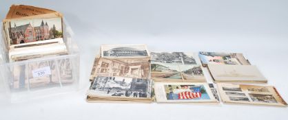 A collection of postcards dating from at the late 19th Century onwards, mostly from around the UK,