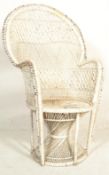 A 20th Century vintage / retro 1970's retro wicker peacock armchair / chair finished in white having