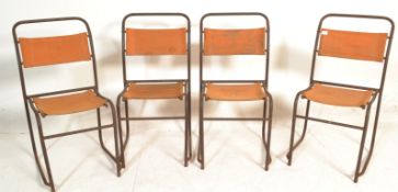 A set of four retro vintage mid 20th century stacking chairs / dining chairs of tubular construction