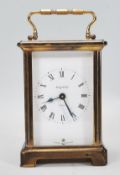 A 20th Century French Bayard 8 day carriage clock being brass cased with three sides set with glazed