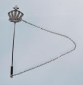 A silver and CZ tie / hatpin in the form of a crown having a cross atop. Stamped 925. Weighs 2.9g.