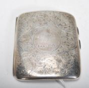 An early 20th Century William Aitken silver hallmarked cigarette case having scrolled foliate