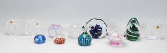 A group of 20th Century studio glass paperweights