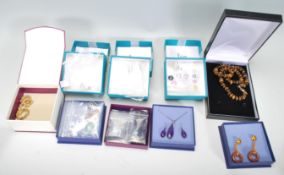 A collection of ladies silver dress jewellery to include a pair of gold plated silver Swarovski