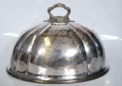 A large 19th Century silverplate on copper meat cover of simple form having a floral and scroll