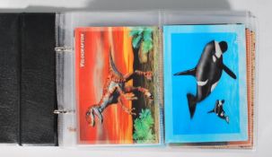 An album of holographic postcards to include a wide selection of animals and flowers. Approx 50
