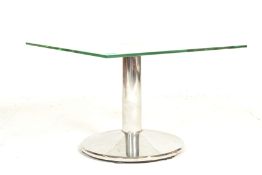 Frovi - A 20th Century side / occasional table having a square frosted glass top raised on a chromed