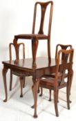 An early 20th Century Edwardian mahogany draw leaf dining table together with a set of four high