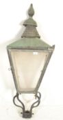 A 19th Century Victorian oxidised copper street lantern of tapering form body, finial top with glass
