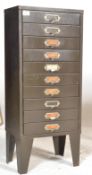 A vintage / retro industrial upright metal ten short drawer filing cabinet, shaped supports having