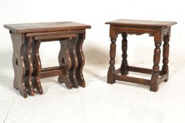 A 1920's oak peg jointed stool raised on turned legs with block feet united by stretchers. Carved