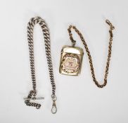 An early 20th Century 1930's vesta case having an applied and enamelled Newcastle on Tyne crest to