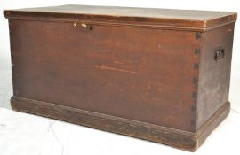 A Victorian 19th century pine vestry box chest raised on a plinth base with panel sides and hinged
