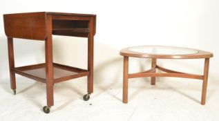 A retro 20th Century Nathan ' Trinity ' coffee table with central glass panel top together with a