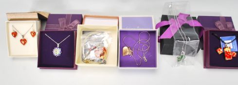 A collection of silver 925 ladies dress jewellery to include an amber pendant necklace with matching