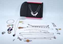 A silver stamped 925 dress necklace together with silver pendant necklaces, earrings, rings, amber