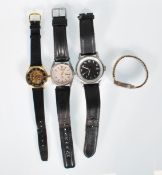 A group of four wrist watches to include a Citizen automatic 21 jewels water resistant watch, an