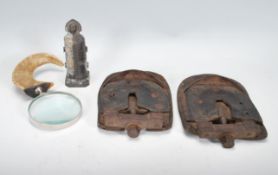 An unusual miniature metal cast medieval iron maiden torture instrument model together with a horn