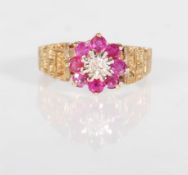 A HALLMARKED 9CT GOLD RUBY AND DIAMOND RING