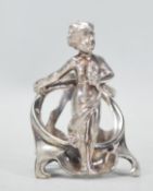 A 1900's German WMF continental Art Nouveau silver white metal bottle coaster holder having an  open