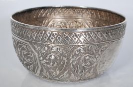 An unmarked but tests at silver, continental trinket bowl having embossed and engraved foliated