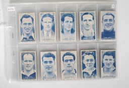A full set of Carreras Turf Cigarettes tarde cards 50 Footballers. Neat trim to the complete set