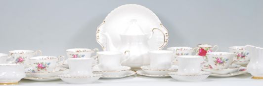 A vintage Royal Albert Val D'or pattern part tea service consisting of tea pot, tea cups, saucers,