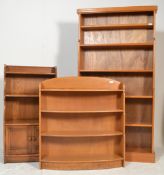 A 20th Century Ercol elm wood bookshelf of stepped graduating form open fronted with five shelves