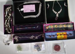 A collection of ladies silver and costume jewellery to include an amethyst silver bangle set with