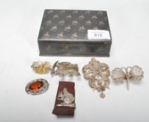 A collection of silver and silver white metal items to include a silver hallmarked Squirrel