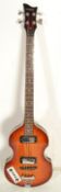 A good vintage Hofner style left handed violin bass guitar having a sunburst body with white control