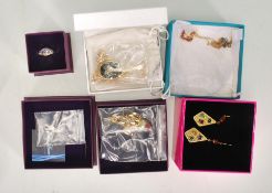 A collection of unused ladies silver dress jewellery to include a gold plated ruby heart pendant