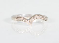 A HALLMARKED 9CT WHITE GOLD & DIAMOND HALF ETERNITY RING