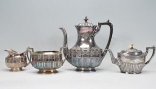 A Walker & Hall Victorian  19th century silver plated 4 piece tea service comprising teapot. sugar