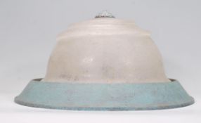 A large Art Deco style heavy glass porch / ceiling light fixture having a large frosted glass dome