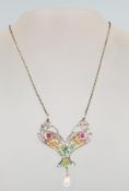 A silver and plique a jour Renaissance style pendant necklace as two doves set with red stone