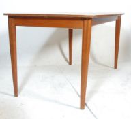 A retro 20th Century Danish inspired teak two leaf draw-leaf extending dining table, the rectangular
