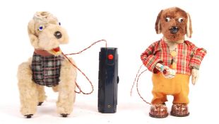 TWO VINTAGE BATTERY OPERATED TINPLATE AND PLUSH TOYS